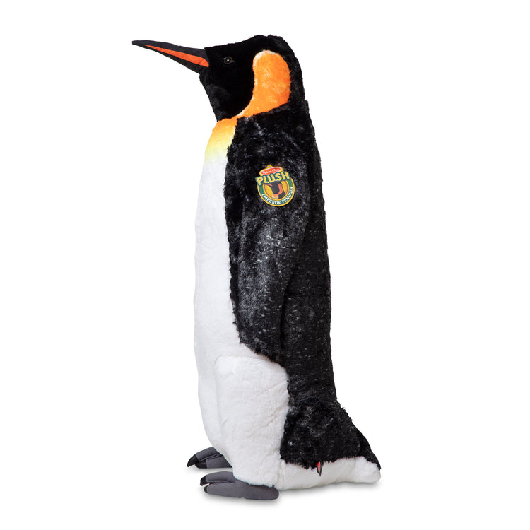 The front of the box for The Melissa & Doug Giant Lifelike Plush Emperor Penguin Standing Stuffed Animal (3.4 Feet Tall)