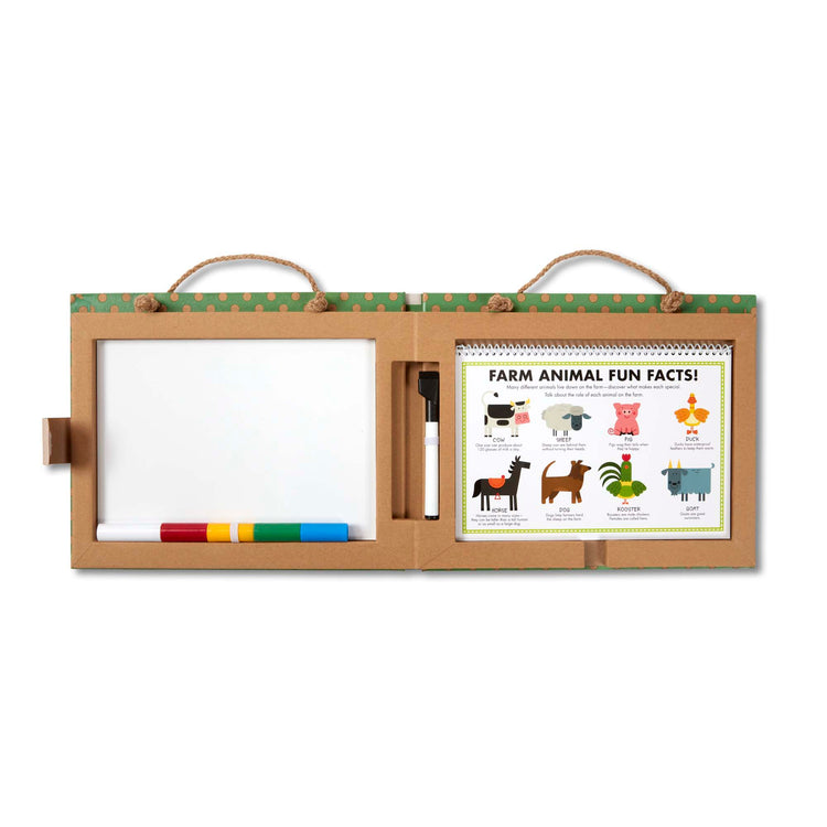 The loose pieces of The Melissa & Doug Natural Play: Play, Draw, Create Reusable Drawing & Magnet Kit – Farm (38 Magnets, 5 Dry-Erase Markers)