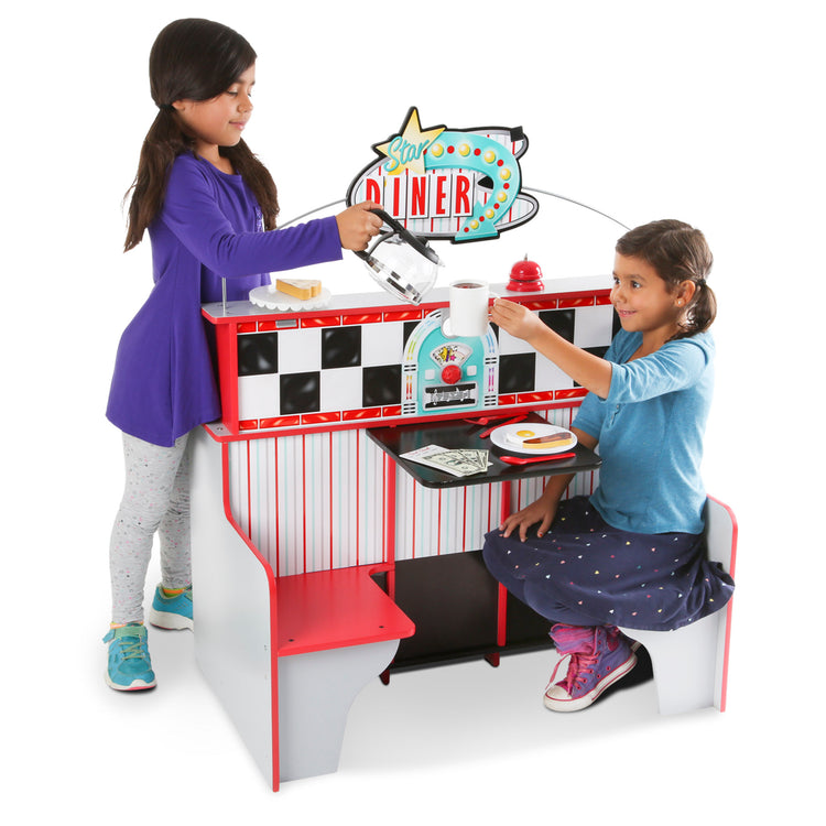 A child on white background with The Melissa & Doug Double-Sided Wooden Star Diner Restaurant Play Space