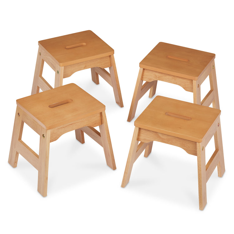 The loose pieces of The Melissa & Doug Wooden Stools – Set of 4 Stackable, Portable 11-Inch-Tall Stools (Natural)