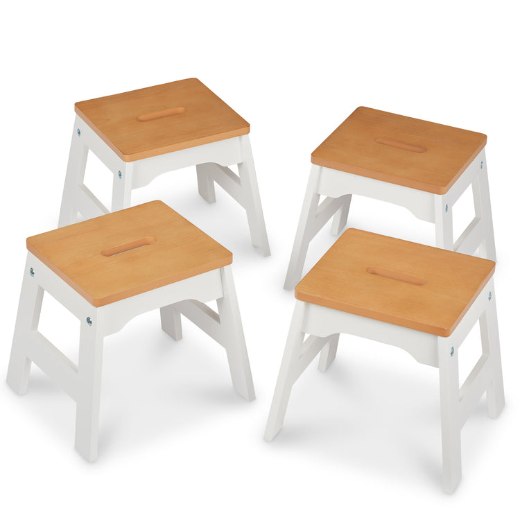 The loose pieces of The Melissa & Doug Wooden Stools – Set of 4 Stackable, Portable 11-Inch-Tall Stools (Natural/White)