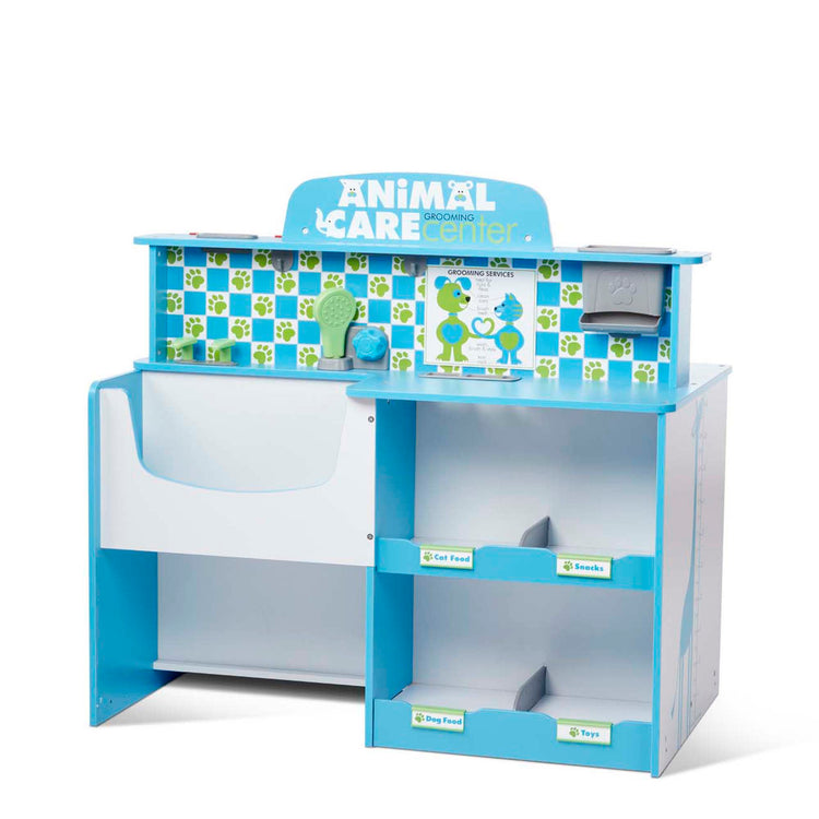An assembled or decorated image of The Melissa & Doug Animal Care Veterinarian and Groomer Wooden Activity Center for Plush Stuffed Pets (Not Included)