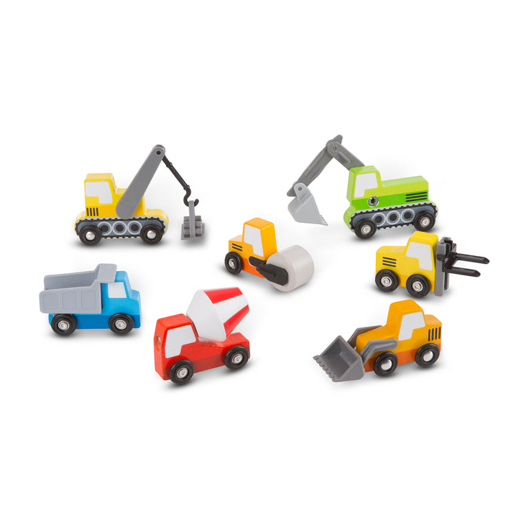 The loose pieces of The Melissa & Doug Wooden Construction Site Vehicles With Wooden Storage Tray (8 pcs)