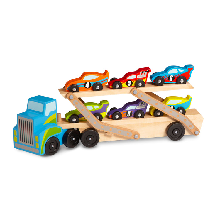 An assembled or decorated image of The Melissa & Doug Mega Race-Car Carrier - Wooden Tractor and Trailer With 6 Unique Race Cars