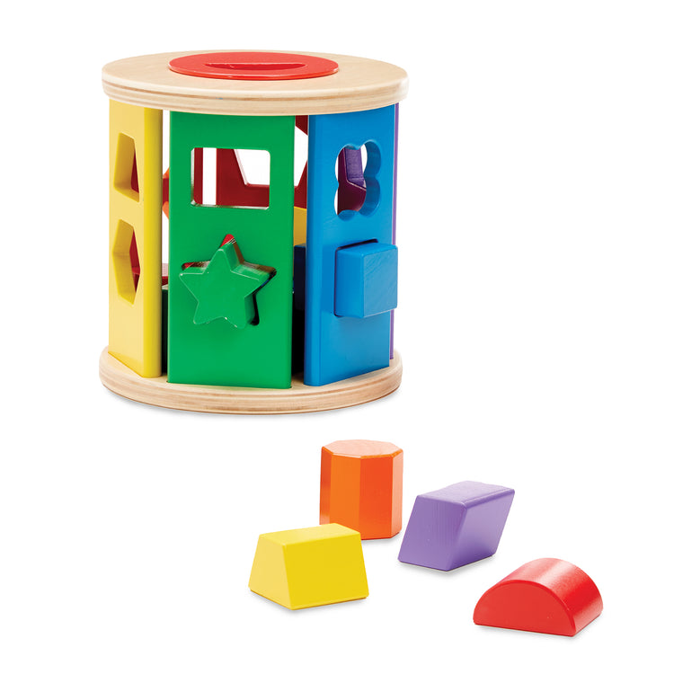 The loose pieces of The Melissa & Doug Match and Roll Wooden Shape Sorter Skill-Building Learning Toy With 13 Pcs