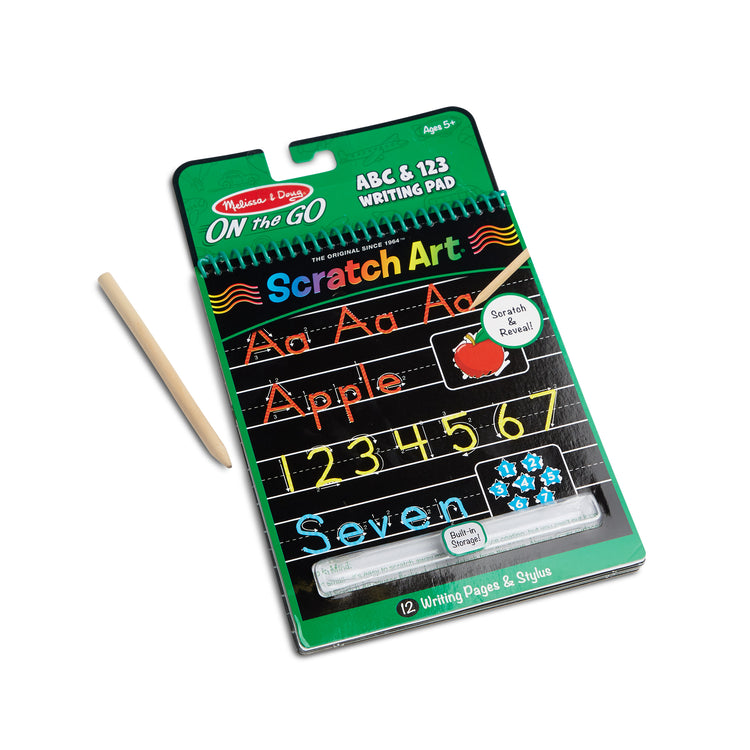 The loose pieces of The Melissa & Doug On the Go Scratch Art Writing Activity Pad – ABC & 123