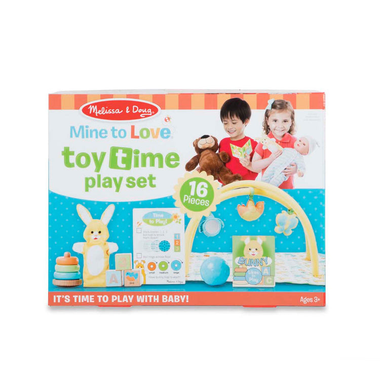 The front of the box for The Melissa & Doug Mine to Love Toy Time Play Set for Dolls with Activity Gym, Stacker, Blocks, More (16 pcs)