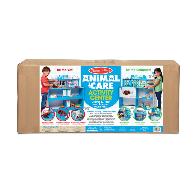 The front of the box for The Melissa & Doug Animal Care Veterinarian and Groomer Wooden Activity Center for Plush Stuffed Pets (Not Included)