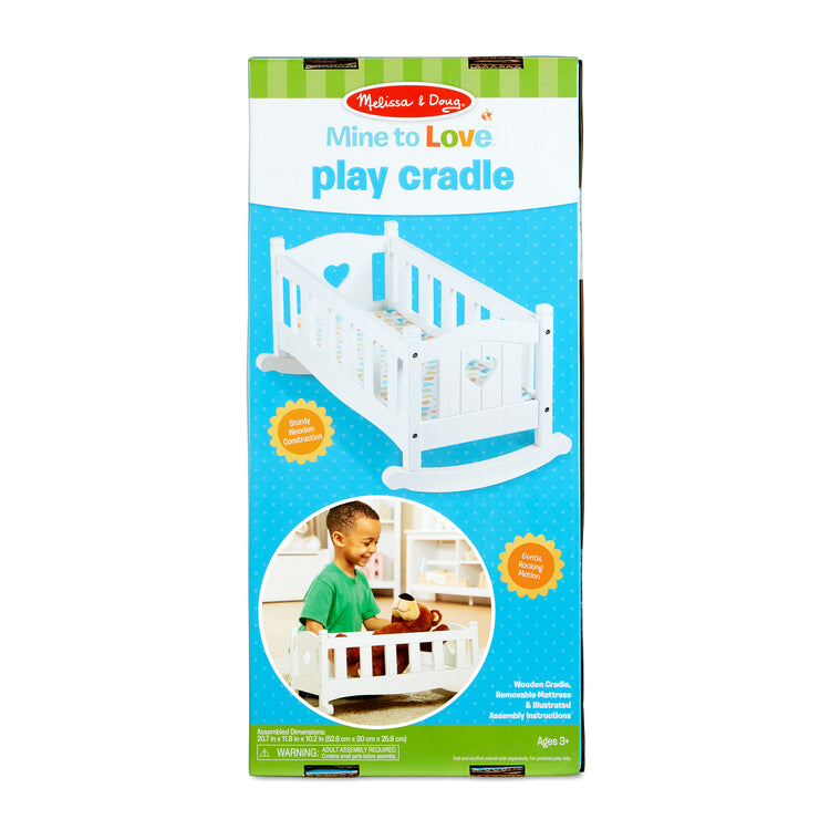 The front of the box for The Melissa & Doug Mine to Love Wooden Play Cradle for Dolls, Stuffed Animals - White