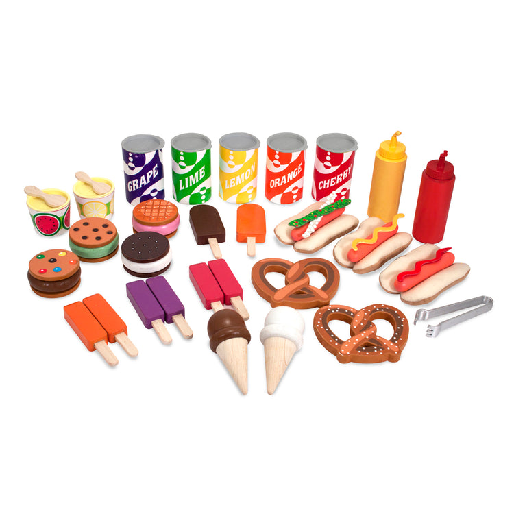 The front of the box for The Melissa & Doug Wooden Snacks and Sweets Food Cart - 40+ Play Food pcs, Reversible Awning