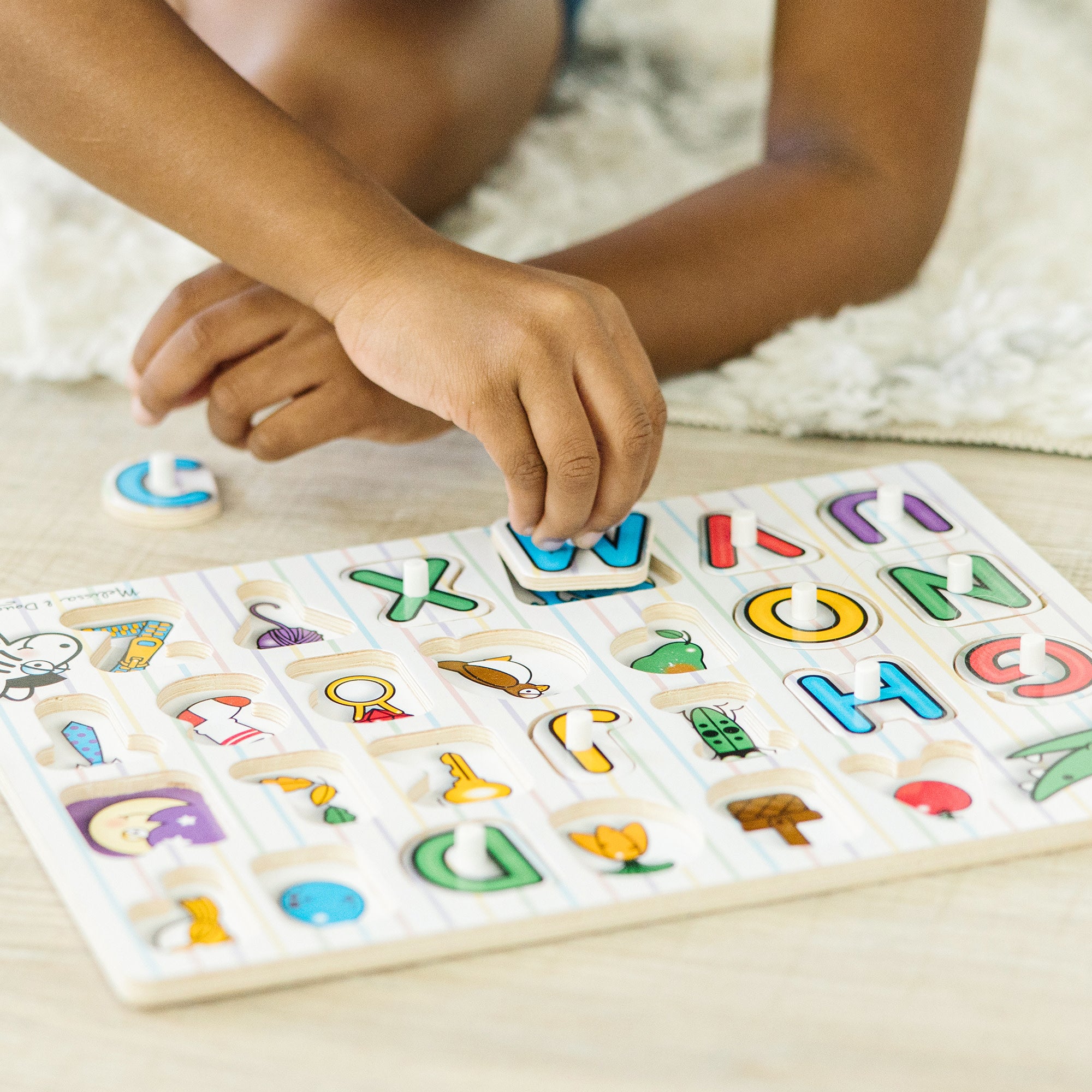 Melissa and doug alphabet cheap peg puzzle