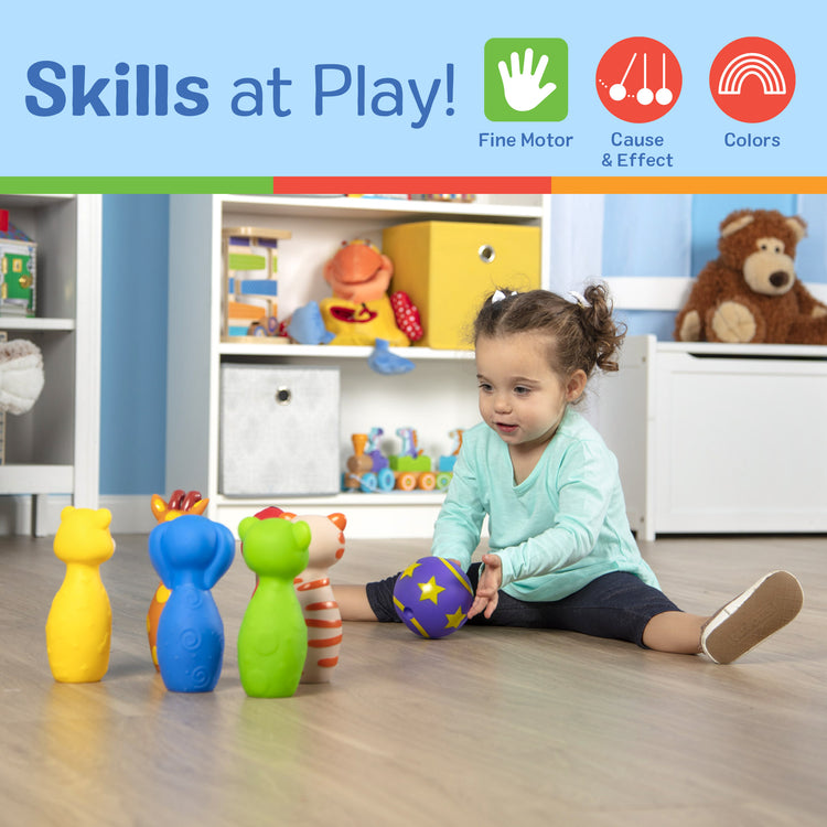 A kid playing with The Melissa & Doug K's Kids Bowling Friends Play Set and Game With 6 Pins and Convenient Carrying Case