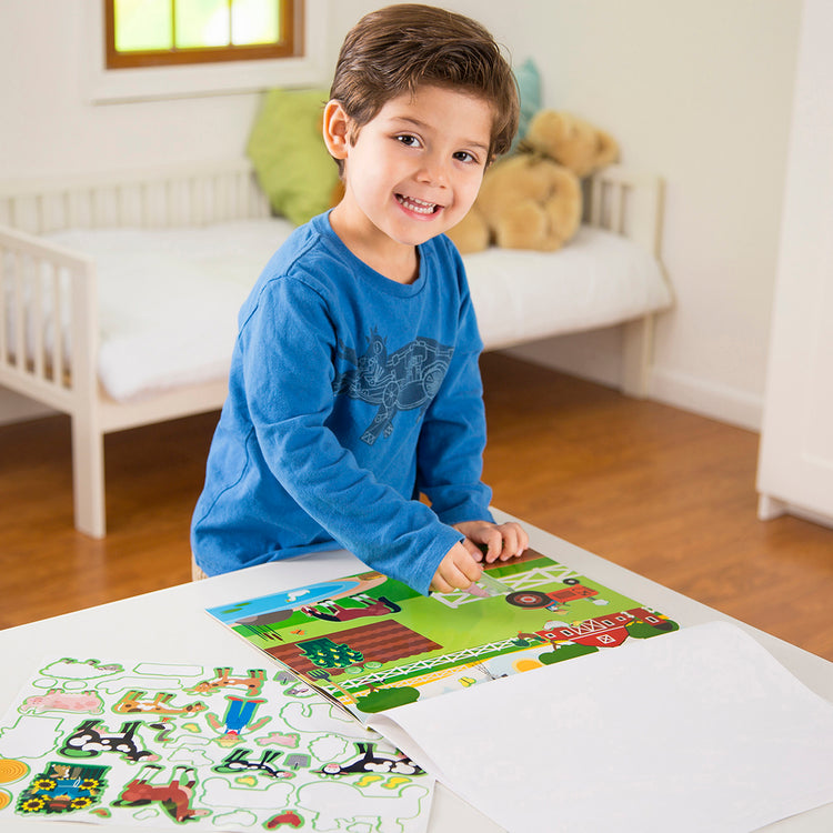 A kid playing with The Melissa & Doug Reusable Sticker Pads Set:  Prehistoric, Habitats, and Vehicles