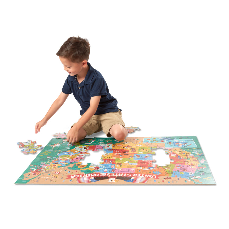 A child on white background with The Melissa & Doug Natural Play Giant Floor Puzzle: America the Beautiful (60 Pieces)