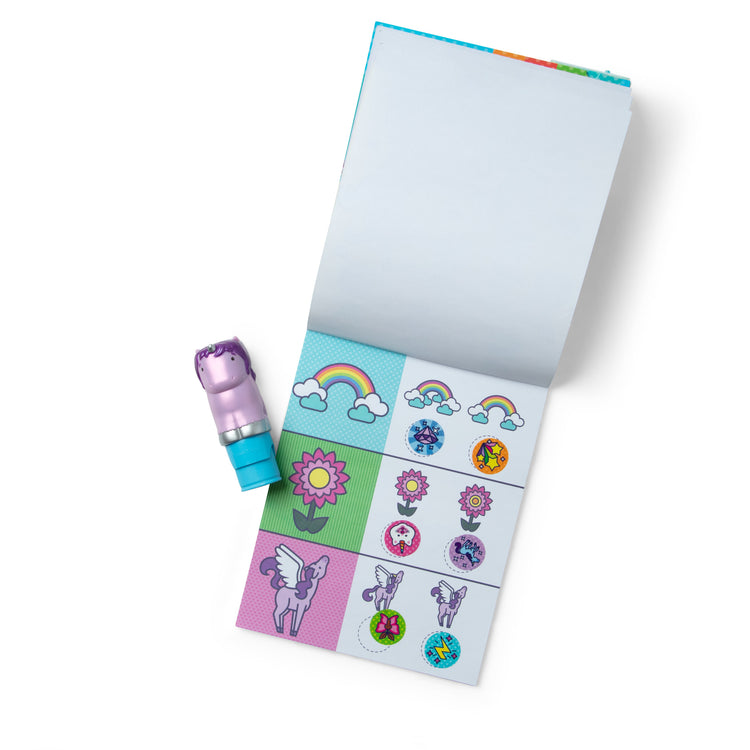 The loose pieces of The Melissa & Doug Sticker WOW!™ Purple Unicorn Bundle: 24-Page Activity Pad, Sticker Stamper, 500 Stickers, Arts and Crafts Fidget Toy Collectible Character