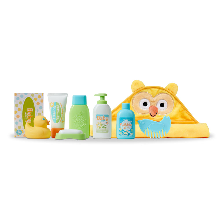 The loose pieces of The Melissa & Doug Mine to Love Changing & Bathtime Play Set for Dolls – Diapers, Pretend Shampoo,Wipes, Towel,  More (19 pcs)