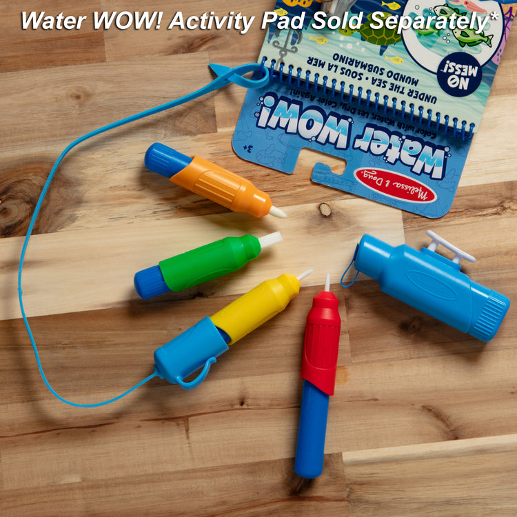 A playroom scene with The Melissa & Doug Water WOW! Pen Pack - 4 Color-with-Water Pens, Sprayer, Tether Cap