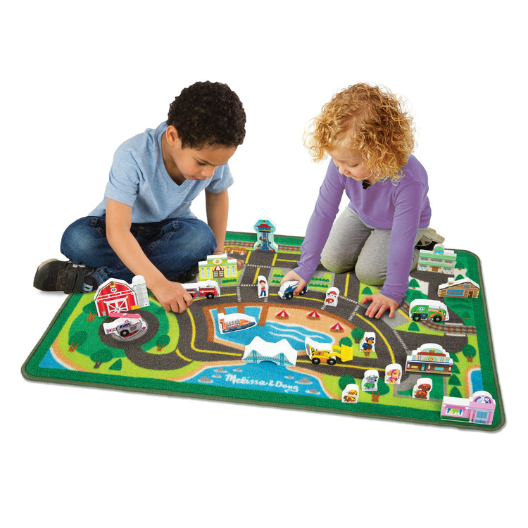 The loose pieces of The Melissa & Doug PAW Patrol Activity Rug - Adventure Bay (22 Pieces)