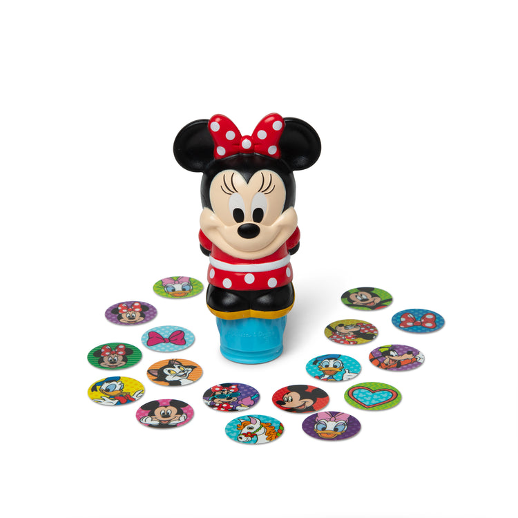 The loose pieces of The Melissa & Doug Sticker WOW!™ 24-Page Activity Pad and Sticker Stamper, 300 Stickers, Arts and Crafts Fidget Toy Collectible Character – Disney Minnie Mouse