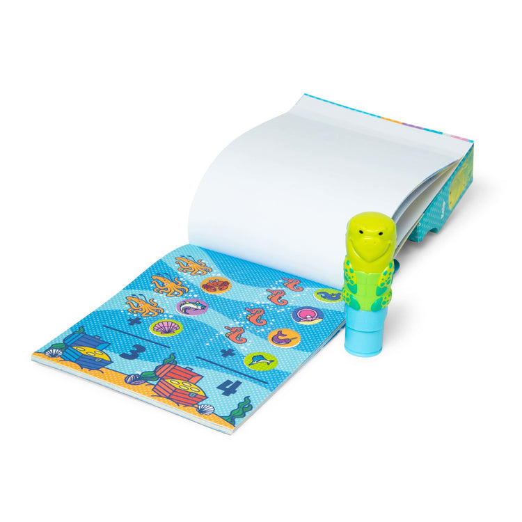 An assembled or decorated The Melissa & Doug Sticker WOW!™ Sea Turtle Bundle: 24-Page Activity Pad, Sticker Stamper, 500 Stickers, Arts and Crafts Fidget Toy Collectible Character