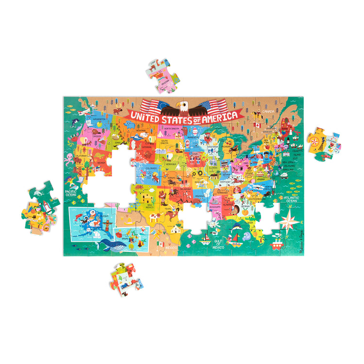 The loose pieces of The Melissa & Doug Natural Play Giant Floor Puzzle: America the Beautiful (60 Pieces)