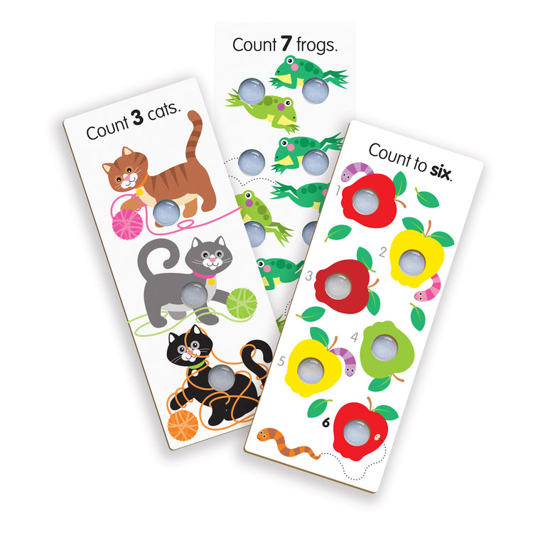 The loose pieces of The Melissa & Doug Poke-A-Dot Jumbo Number Learning Cards - 13 Double-Sided Numbers, Shapes, and Colors Cards with Buttons to Pop