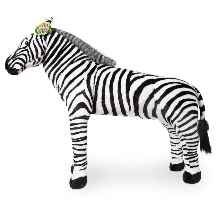 The front of the box for The Melissa & Doug Giant Striped Zebra - Lifelike Stuffed Animal (nearly 3 feet tall)