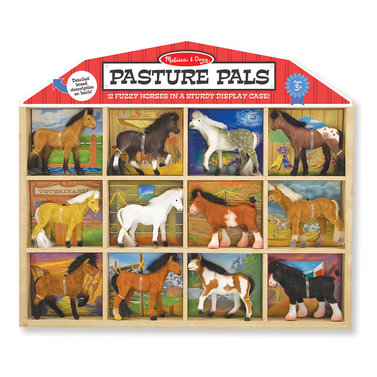 The loose pieces of The Melissa & Doug Pasture Pals - 12 Collectible Horses With Wooden Barn-Shaped Crate