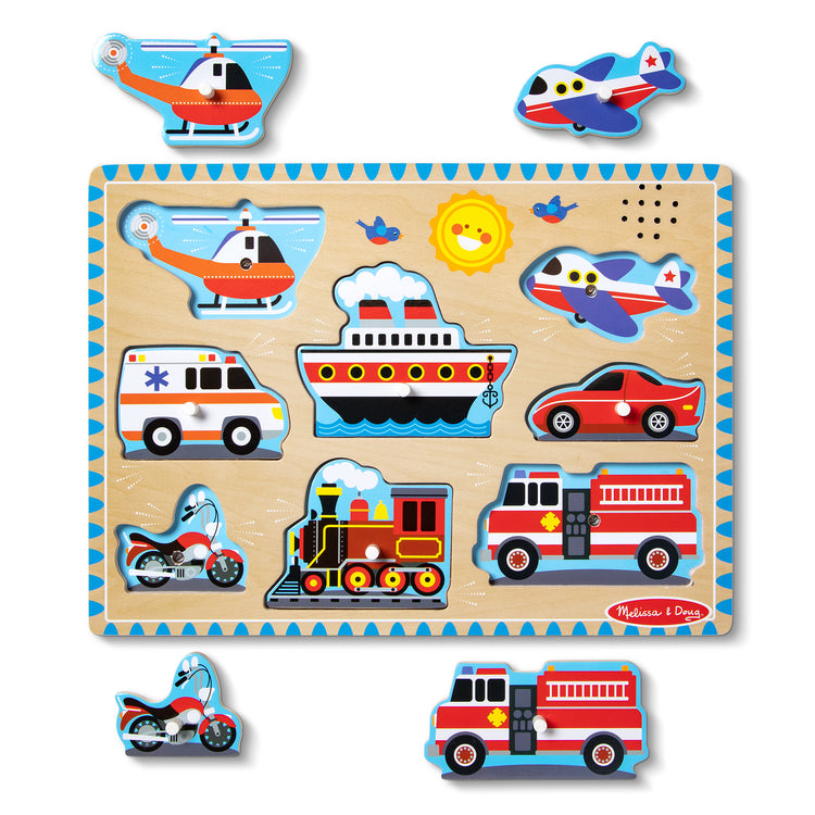 The loose pieces of The Melissa & Doug Vehicles Sound Puzzle - Wooden Peg Puzzle With Light-Activated Sound Effects (8 pcs)