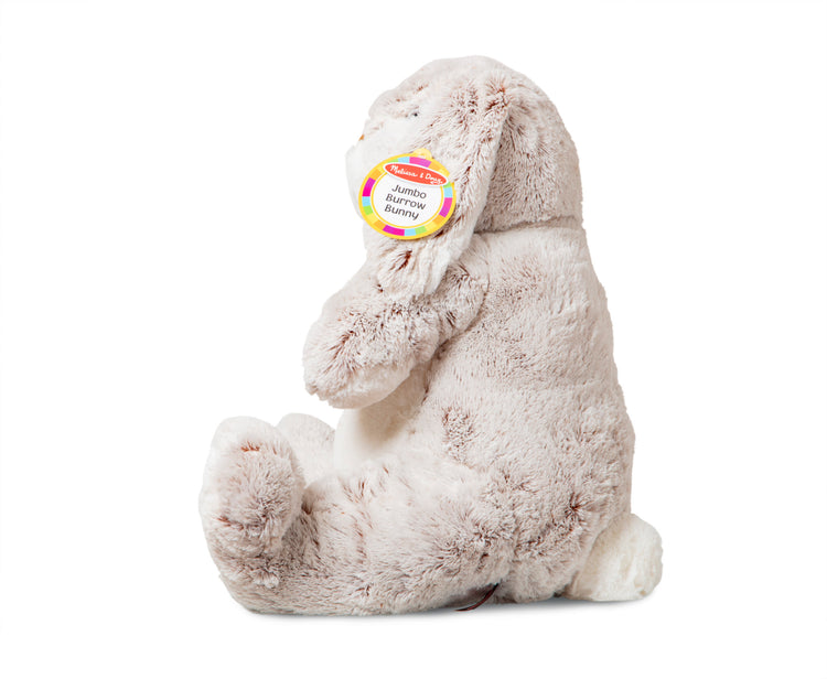 The front of the box for The Melissa & Doug Jumbo Burrow Bunny Lop-Eared Rabbit Stuffed Plush Animal (21 Inches Tall)