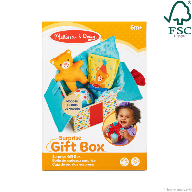 The front of the box for The Melissa & Doug Wooden Surprise Gift Box Infant Toy (5 Pieces)
