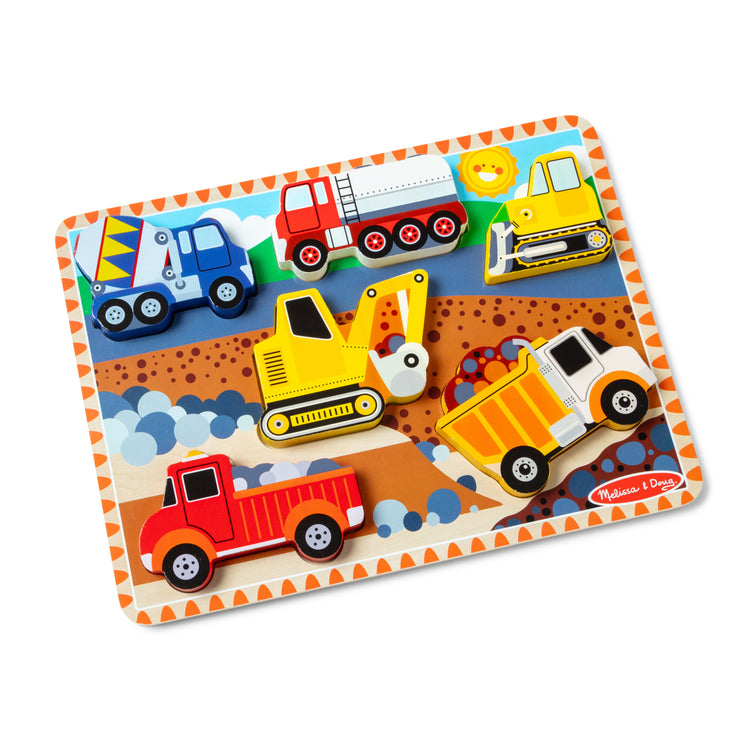 The loose pieces of The Melissa & Doug Construction Vehicles Wooden Chunky Puzzle (6 pcs)