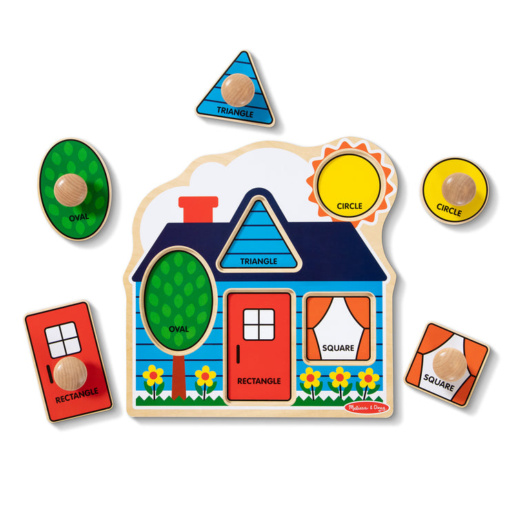 The loose pieces of The Melissa & Doug First Shapes Jumbo Peg Wooden Puzzle