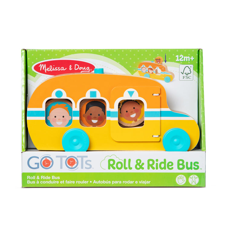 A kid playing with The Melissa & Doug GO Tots Wooden Roll & Ride Bus with 3 Disks