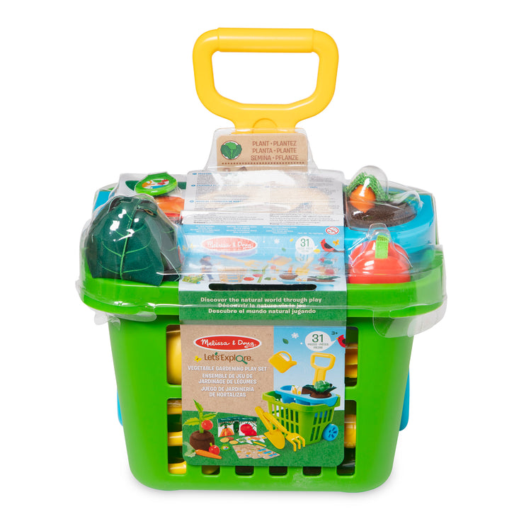 The front of the box for The Melissa & Doug Let’s Explore Vegetable Gardening Play Set with Rolling Cart (31 Pieces)