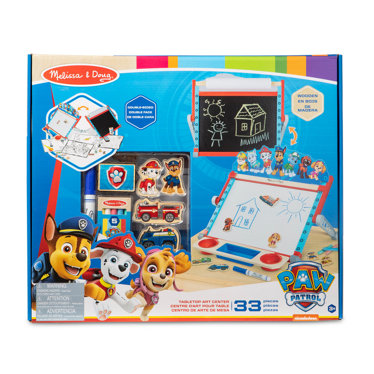 The front of the box for The Melissa & Doug PAW Patrol Wooden Double-Sided Tabletop Art Center Easel (33 Pieces)
