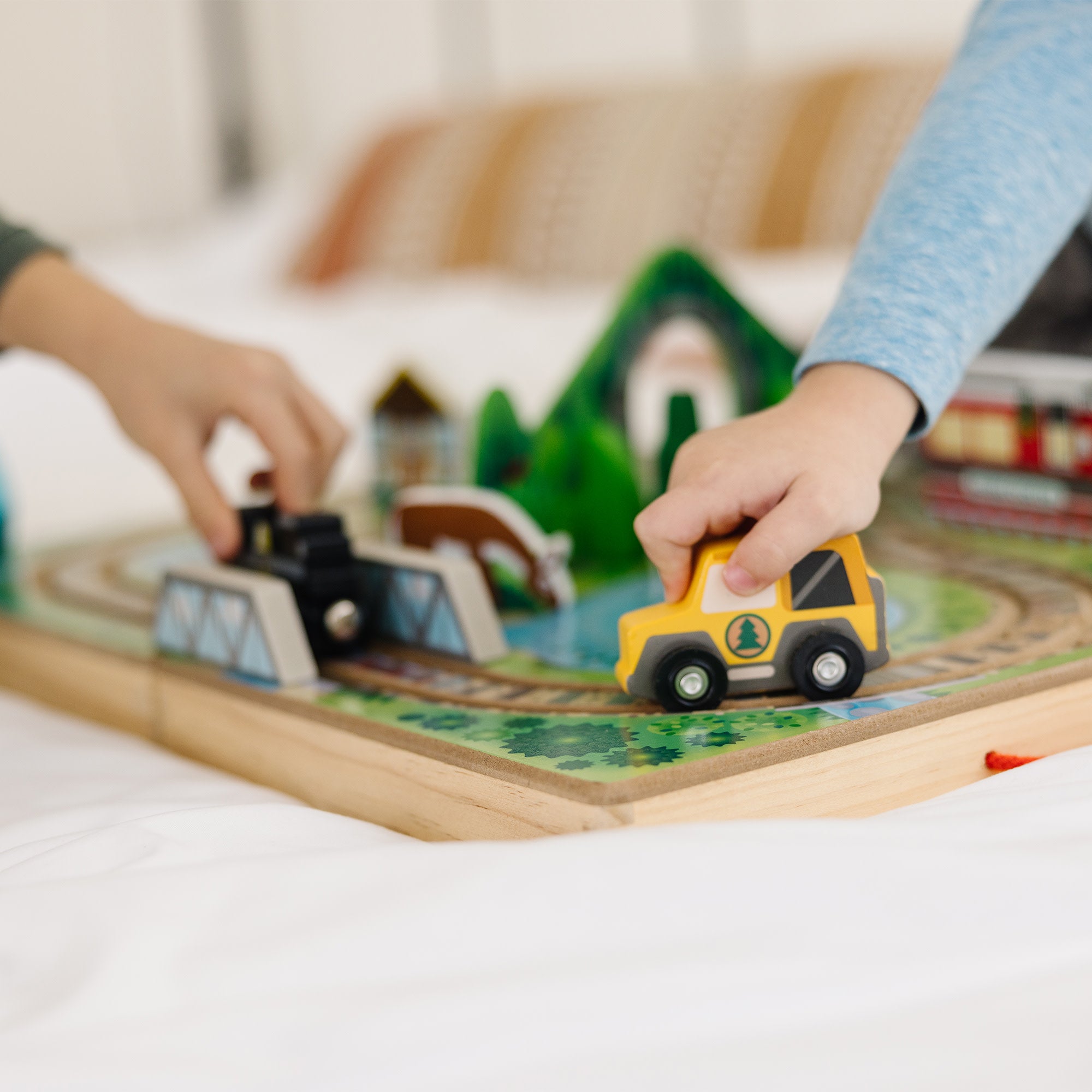 Melissa and doug sales take along railroad