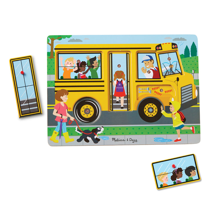 The loose pieces of The Melissa & Doug The Wheels on the Bus Sound Puzzle