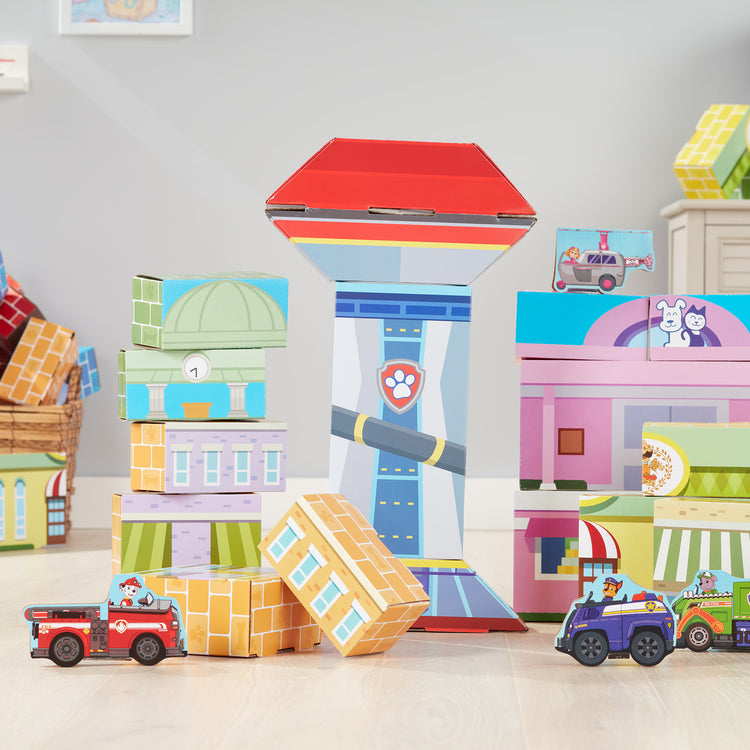 A playroom scene with The Melissa & Doug PAW Patrol Jumbo Cardboard Blocks (41 Pieces)