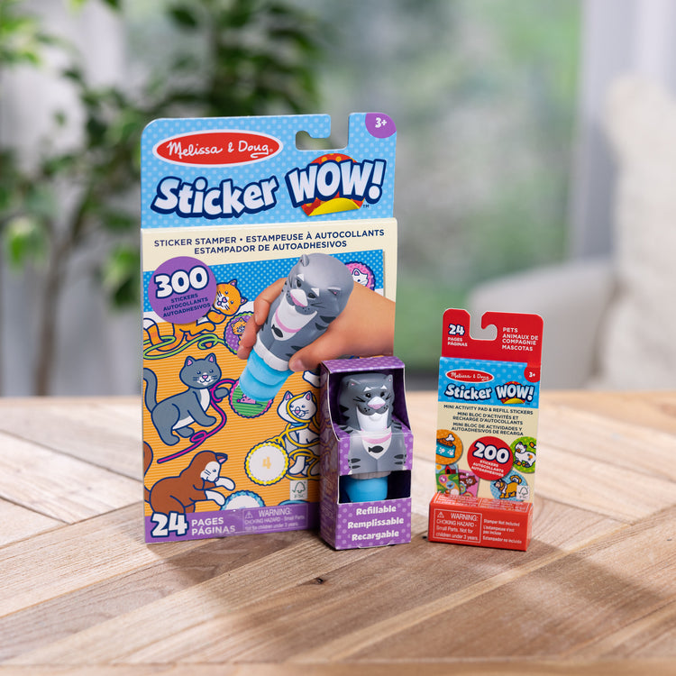 A playroom scene with The Melissa & Doug Sticker WOW!™ Cat Bundle: 24-Page Activity Pad, Sticker Stamper, Mini Activity Pad, 500 Stickers, Arts and Crafts Fidget Toy Collectible Character