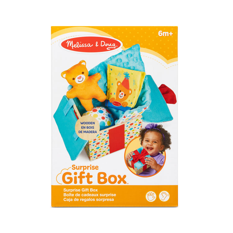 The loose pieces of The Melissa & Doug Wooden Surprise Gift Box Infant Toy (5 Pieces)