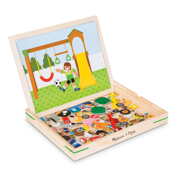 The loose pieces of The Melissa & Doug Wooden Magnetic Matching Picture Game With 119 Magnets and Scene Cards