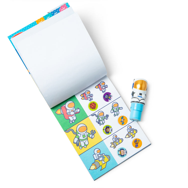 The loose pieces of The Melissa & Doug Sticker WOW!™ Astronaut Bundle: 24-Page Activity Pad, Sticker Stamper, Mini Activity Pad, 500 Stickers, Arts and Crafts Fidget Toy Collectible Character