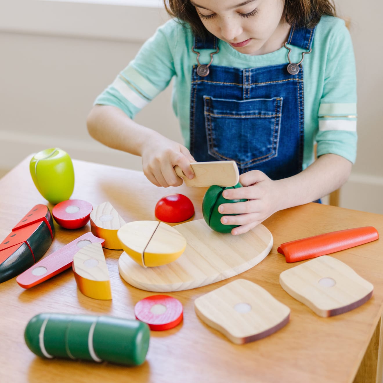 Melissa and cheap doug cutting food