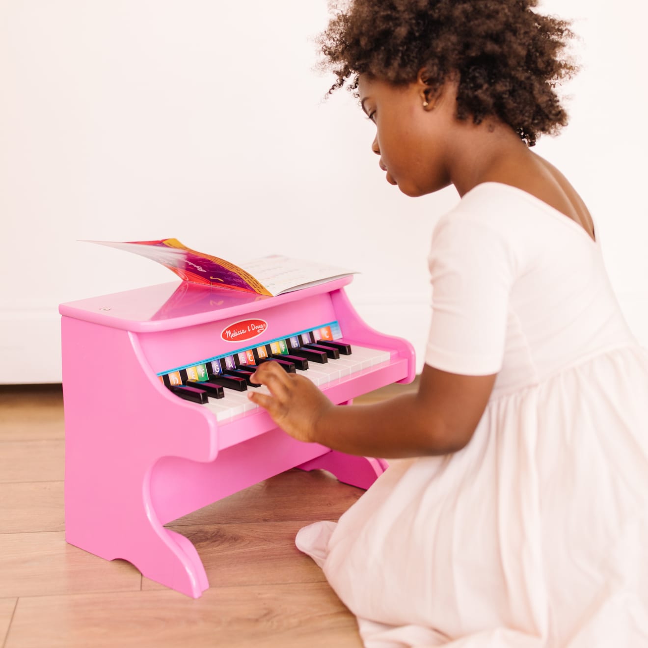 Melissa and doug store pink piano