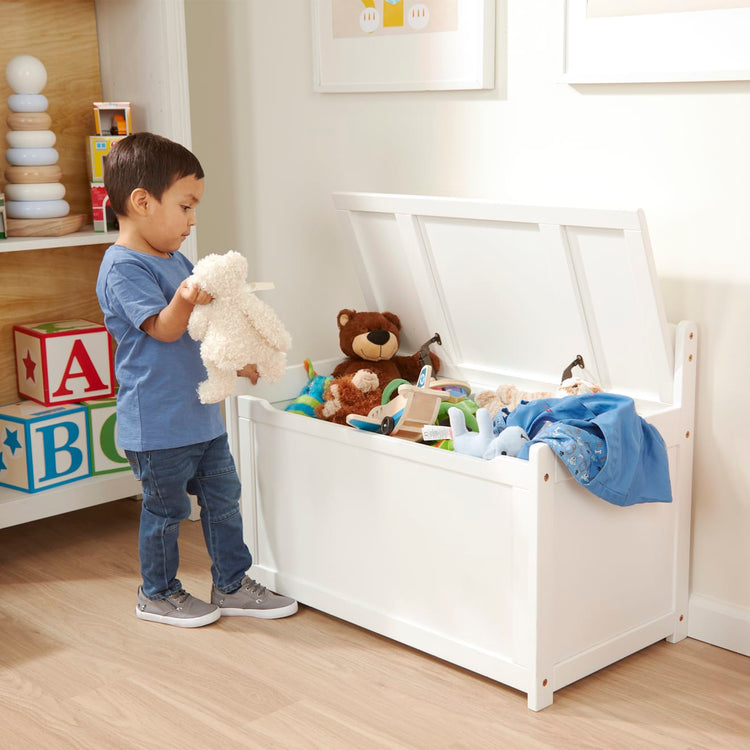 https://www.melissaanddoug.com/cdn/shop/products/Wooden-Toy-Chest-White-030228-1-Kid-Lifestyle_d9200aec-915f-4db6-a100-b6c94afe6998.jpg?v=1664912738&width=750